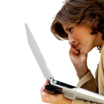 Side profile of a businesswoman holding a laptop