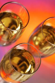 High angle view of champagne in three champagne flutes