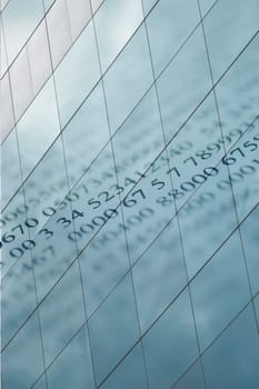 Close-up of numbers reflected on glass