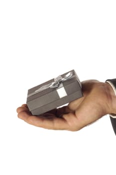 Close-up of a businessman holding a gift
