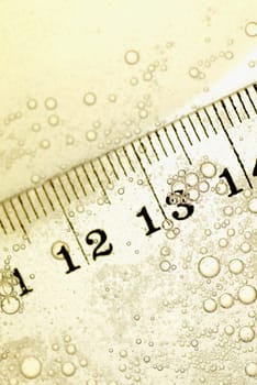 Close-up of a ruler in water