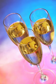 High angle view of champagne in three champagne flutes
