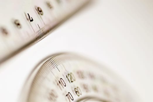 Close-up of a protractor and a ruler