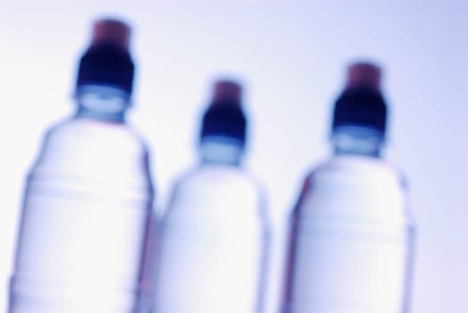 Close-up of three water bottles