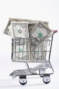 Close_up of paper currency in a shopping cart
