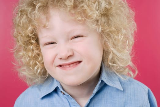 Close_up of a boy making a face