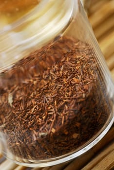 Close-up of dry herbs in a jar