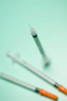 Close_up of three syringes