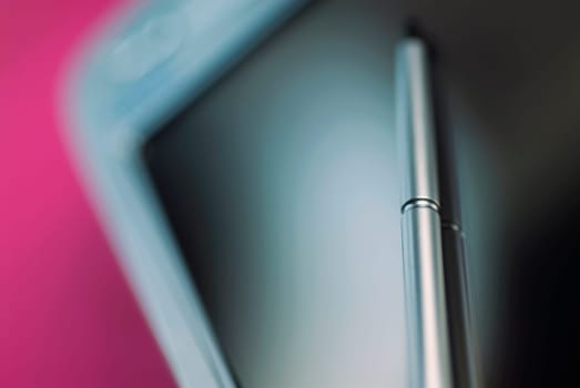 Close_up of stylus with a personal data assistant