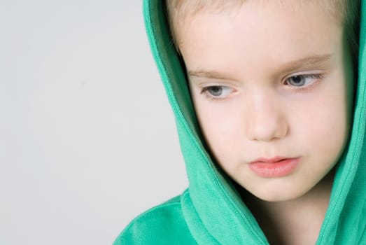 Close_up of a boy thinking