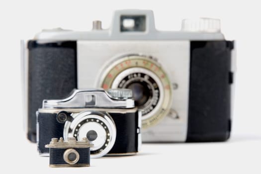 Close-up of three cameras
