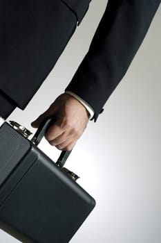 Close-up of a man holding a case