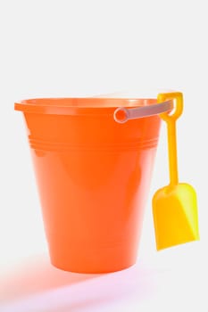 Close-up of a sand pail and a shovel