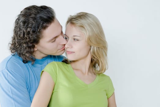 Close_up of a young couple romancing