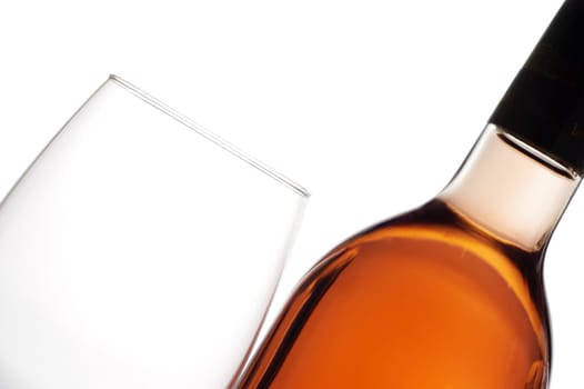 Close-up of a wineglass and a wine bottle