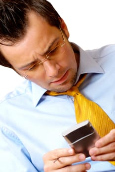 Close-up of a businessman operating a personal data assistant