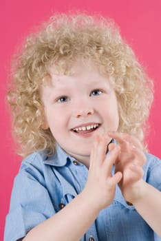 Close_up of a boy clapping