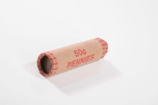 Close_up of a coin roll of pennies