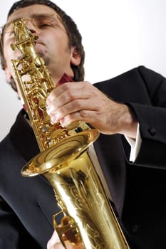 Low angle view of a musician playing the saxophone