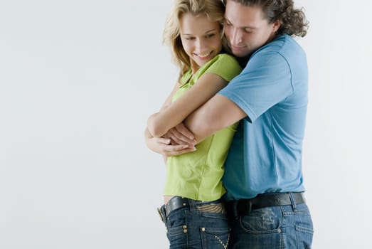 Side profile of a young couple romancing