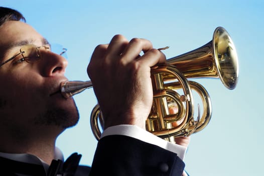 Close-up of a musician playing the trumpet