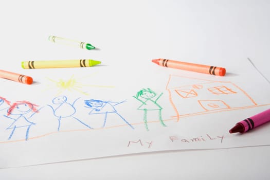 Crayons on a sheet of paper