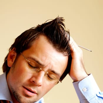 Close-up of a businessman holding a digitized pen