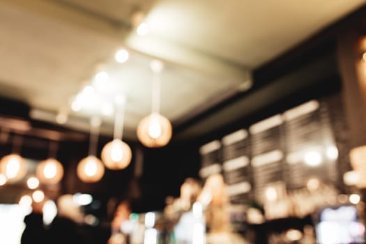 Blurred loft coffee shop with barista and customer. High quality photo