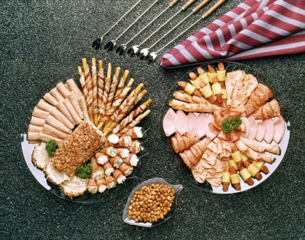 High angle view of assorted foods on plates