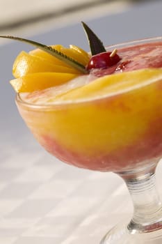 Close-up of orange juice in a stem glass