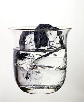 Close-up of ice cubes in a glass of water