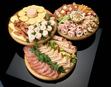 High angle view of picada jamones on plates