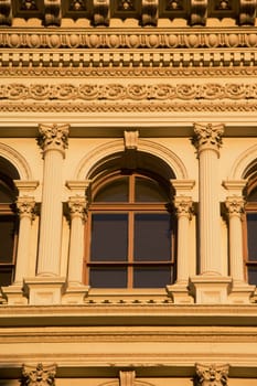 Building with windows and carved panels