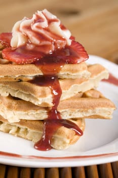 Close-up of a strawberry waffle in a plate
