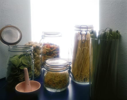 Assorted pasta in glass jars