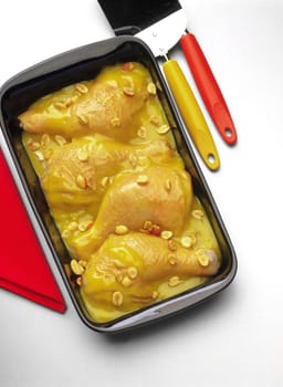 High angle view of chicken legs in a serving tray