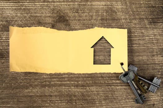 Keys with house symbol. House building, loan, real estate or buying a new home concept.