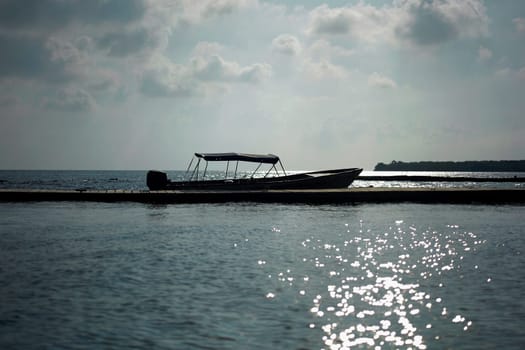 Motorboat moored at a pier