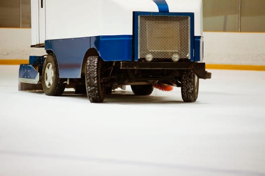 Close-up of an ice resurfacing machine in an ice rink