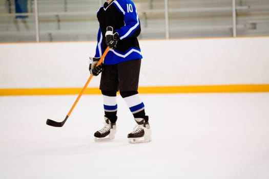 Ice hockey player playing ice hockey