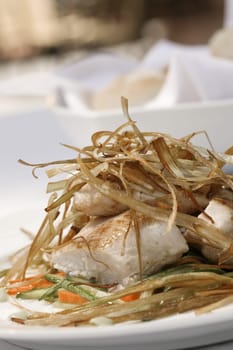 Close-up of fish fillets in a plate