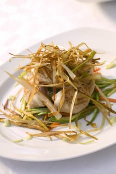 Close-up of fish fillets in a plate