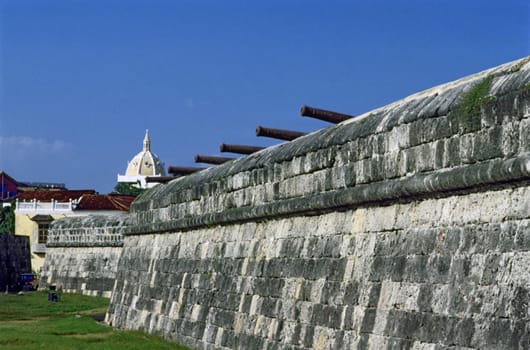 Low angle view of cannons on a stone wall