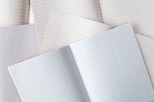 Various exercise books with copy-space. Education concept.
