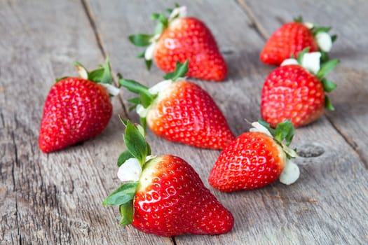 Close up of Fresh strawberries on wood table background