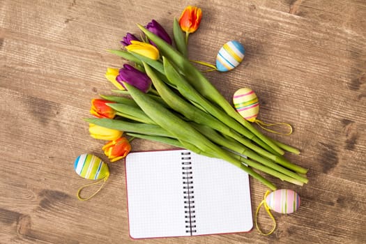 Easter decoration and blank notebook for copy-space