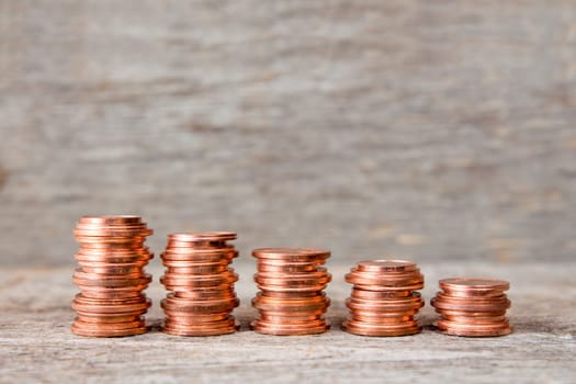 Five stacks of copper coins  increase in height