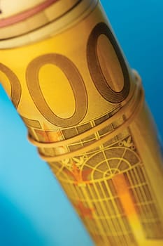 Close-up of a roll of Euro banknotes