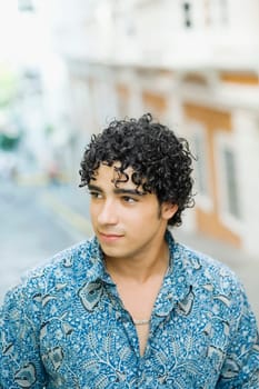 Close-up of a young man looking sideways