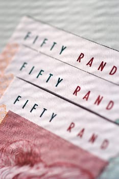 Three 50 South African Rand bank notes, close-up
